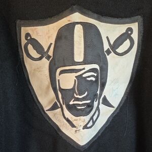 Black Raiders Logo Jacket With Signitures From The 80s